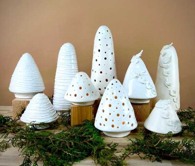 Christmas Trees Fir- 6.5 dia x 5.5" h, Pine- 6.5 dia x 8.75" h, or Spruce 5.5 dia x 14" h. Available 3 ways; with doves, garland or cut-outs.
